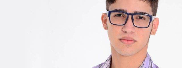 Eye doctor, teenage boy suffering from astigmatism in Fort Lauderdale, FL