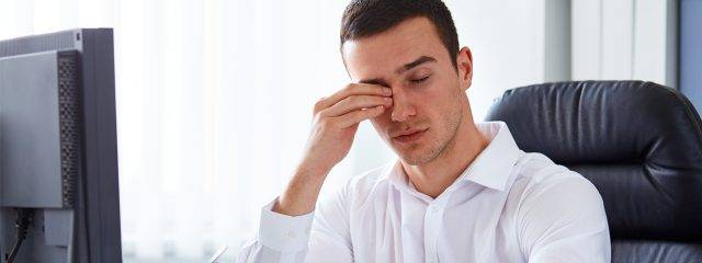 Optometrist, man suffering from digital eye strain in Fort Lauderdale, FL